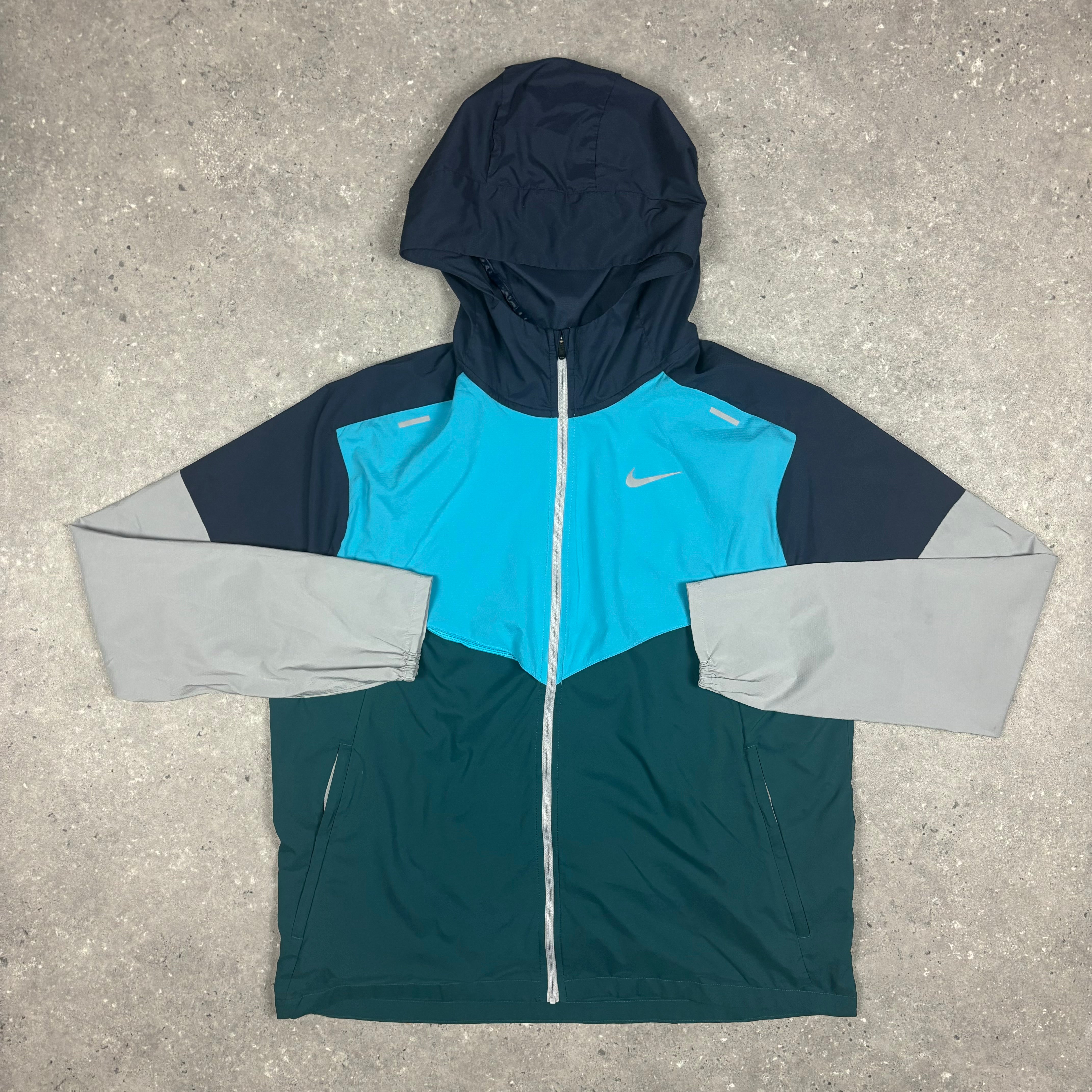 NIKE UV WINDRUNNER PETROL BLUE (FITS M)