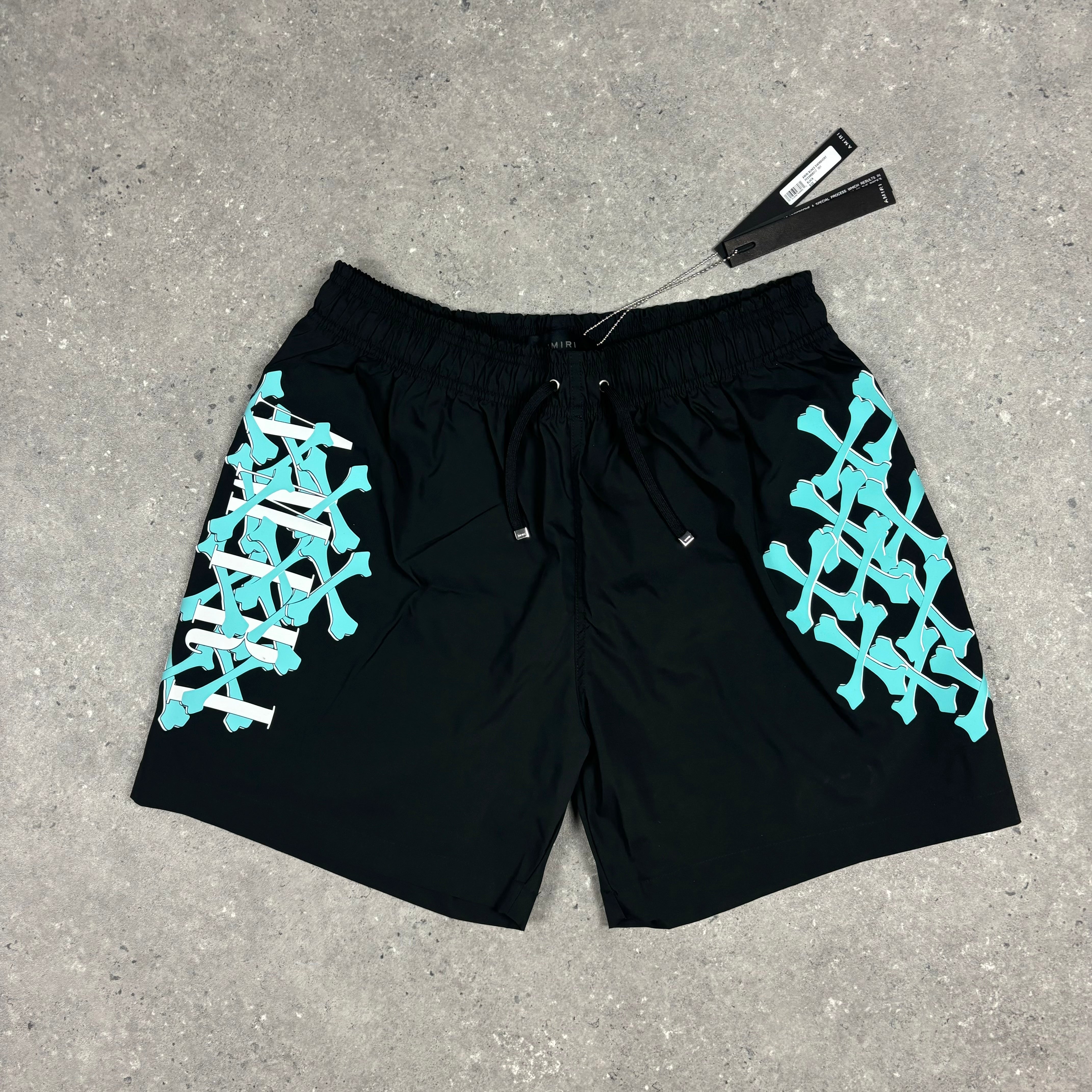 AMIRI BONE SWIM SHORTS