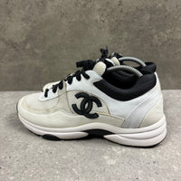 CHANEL RUNNERS CREAM/BLACK -  (EU 41 / UK 7)
