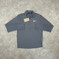 NIKE STRIDE 1/4 ZIP TOP - GREY