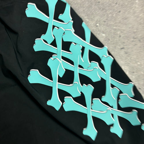 AMIRI BONE SWIM SHORTS