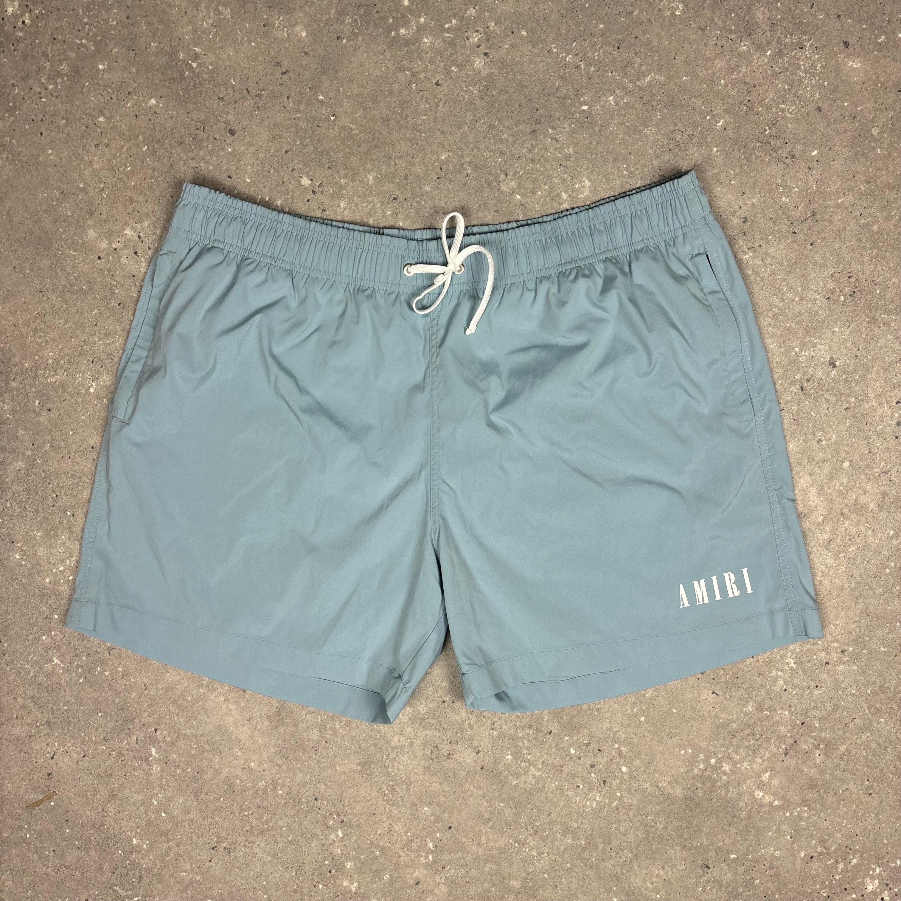 AMIRI DUSTY BLUE SWIM SHORTS - (XL)