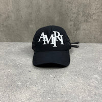 AMIRI SCATTER LOGO TRUCKER CAP