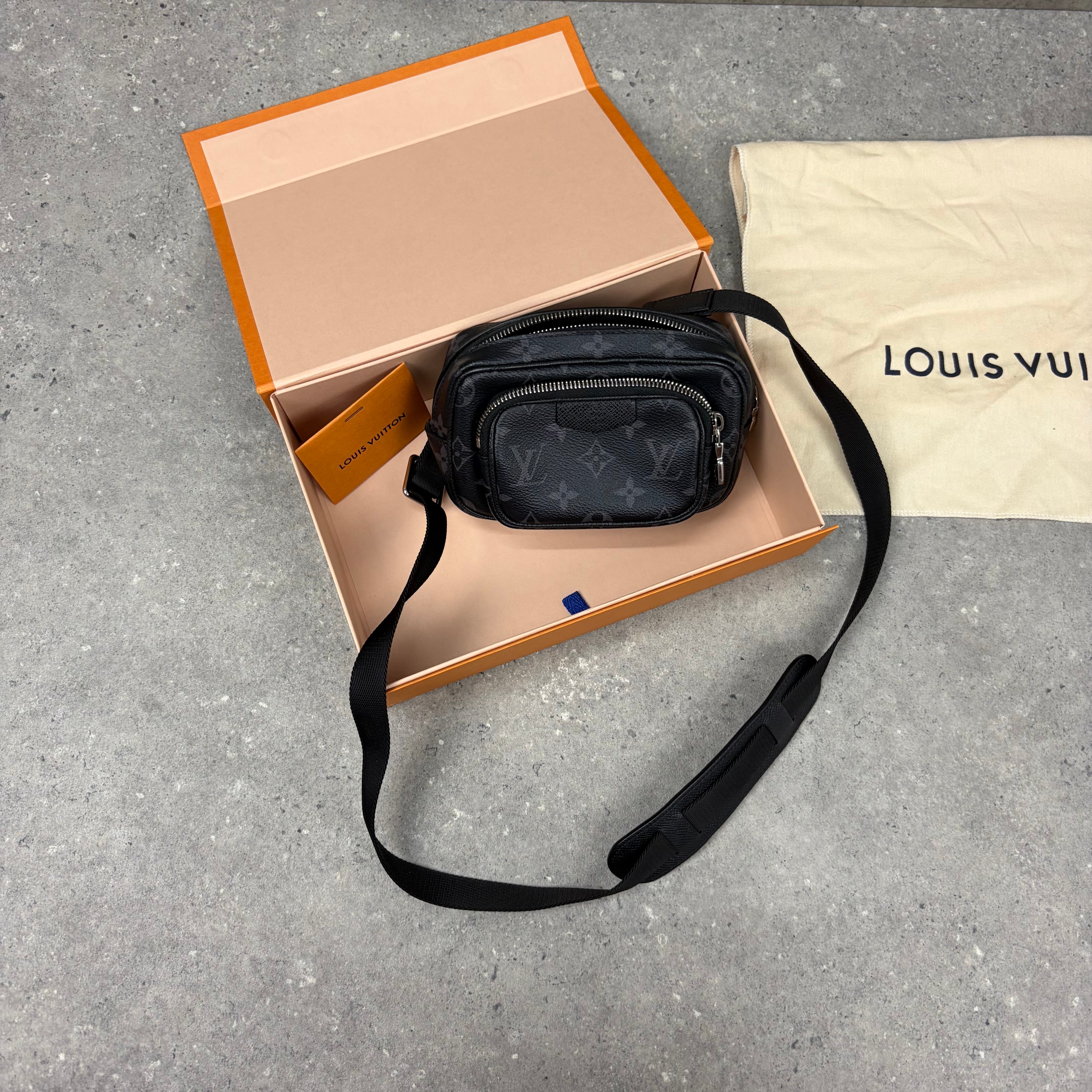 LOUIS VUITTON MONOGRAM ECLIPSE POUCH BAG - BLACK