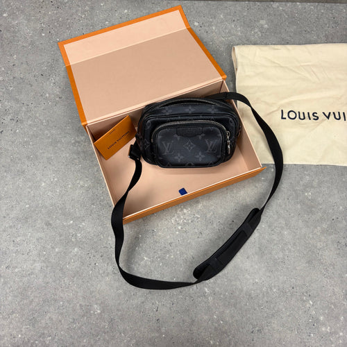 LOUIS VUITTON MONOGRAM ECLIPSE POUCH BAG - BLACK