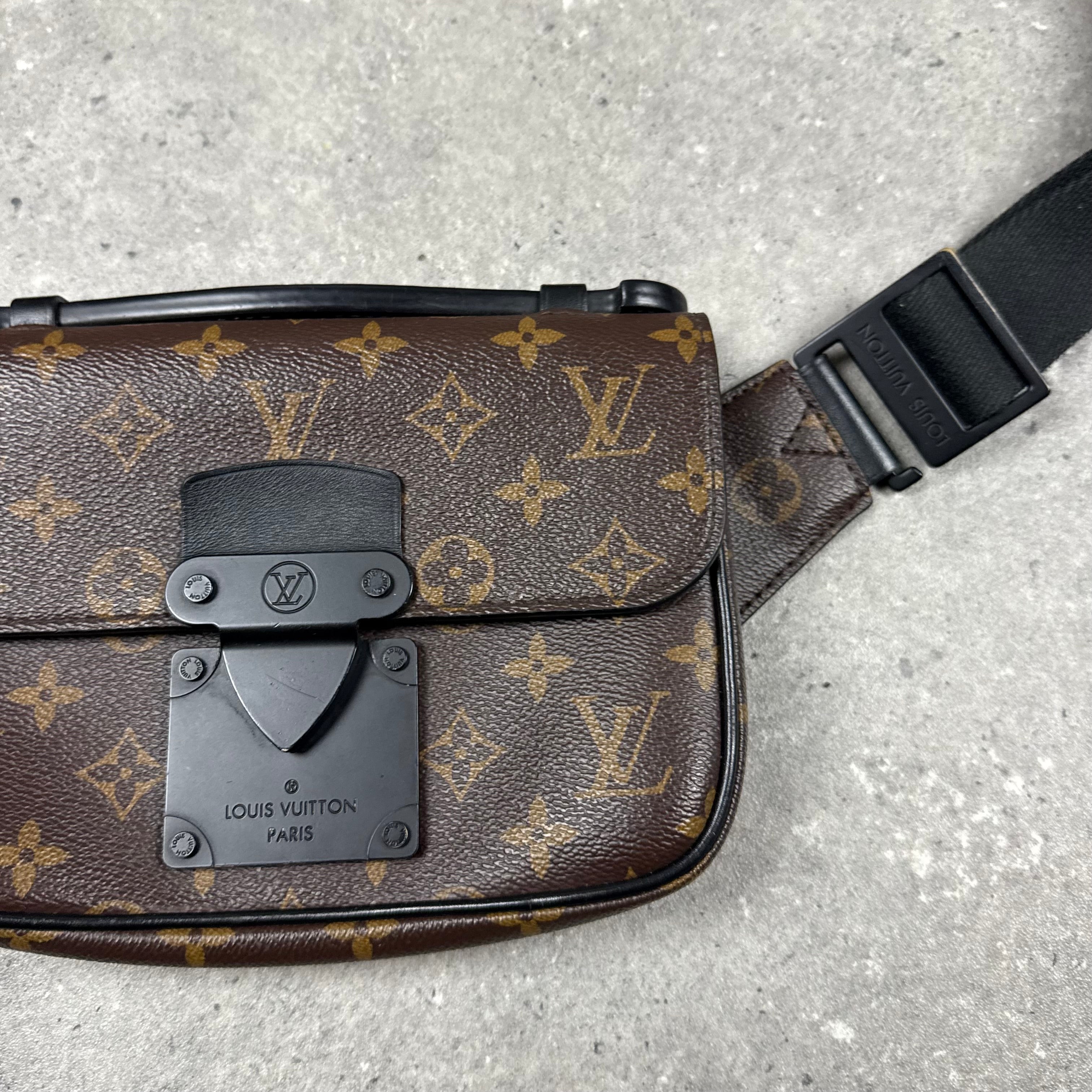 LOUIS VUITTON LOCK CROSS BODY BAG