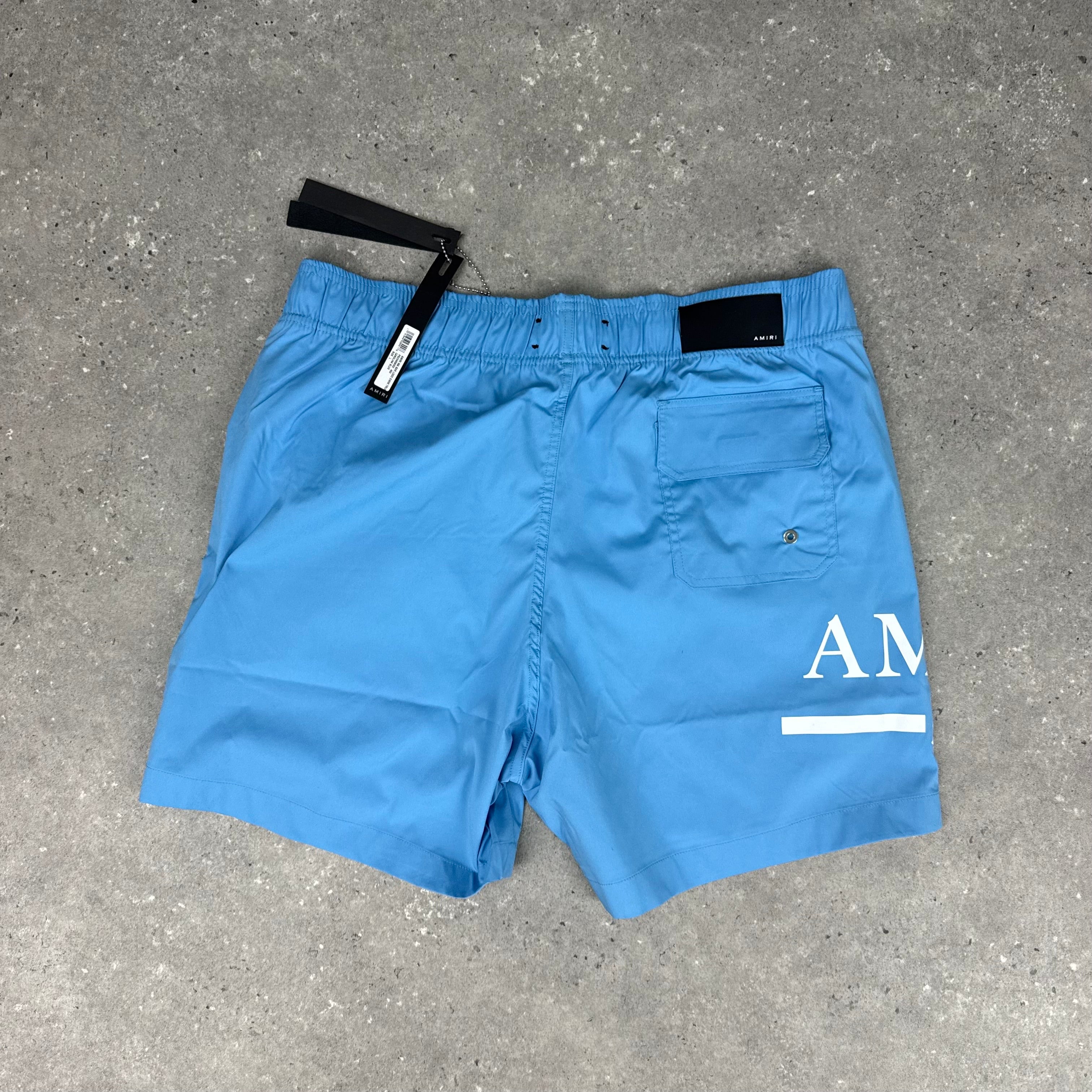 AMIRI CAROLINA BLUE SWIM SHORTS - (XL)