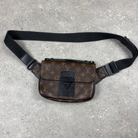 LOUIS VUITTON LOCK CROSS BODY BAG