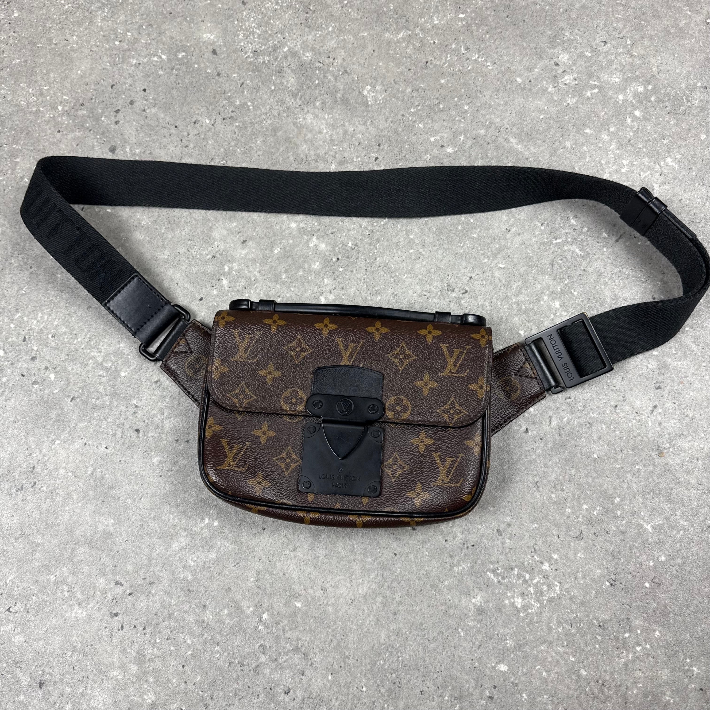 LOUIS VUITTON LOCK CROSS BODY BAG