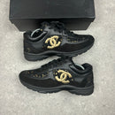 CHANEL RUNNERS BLACK / GOLD -  (EU44 / UK10)