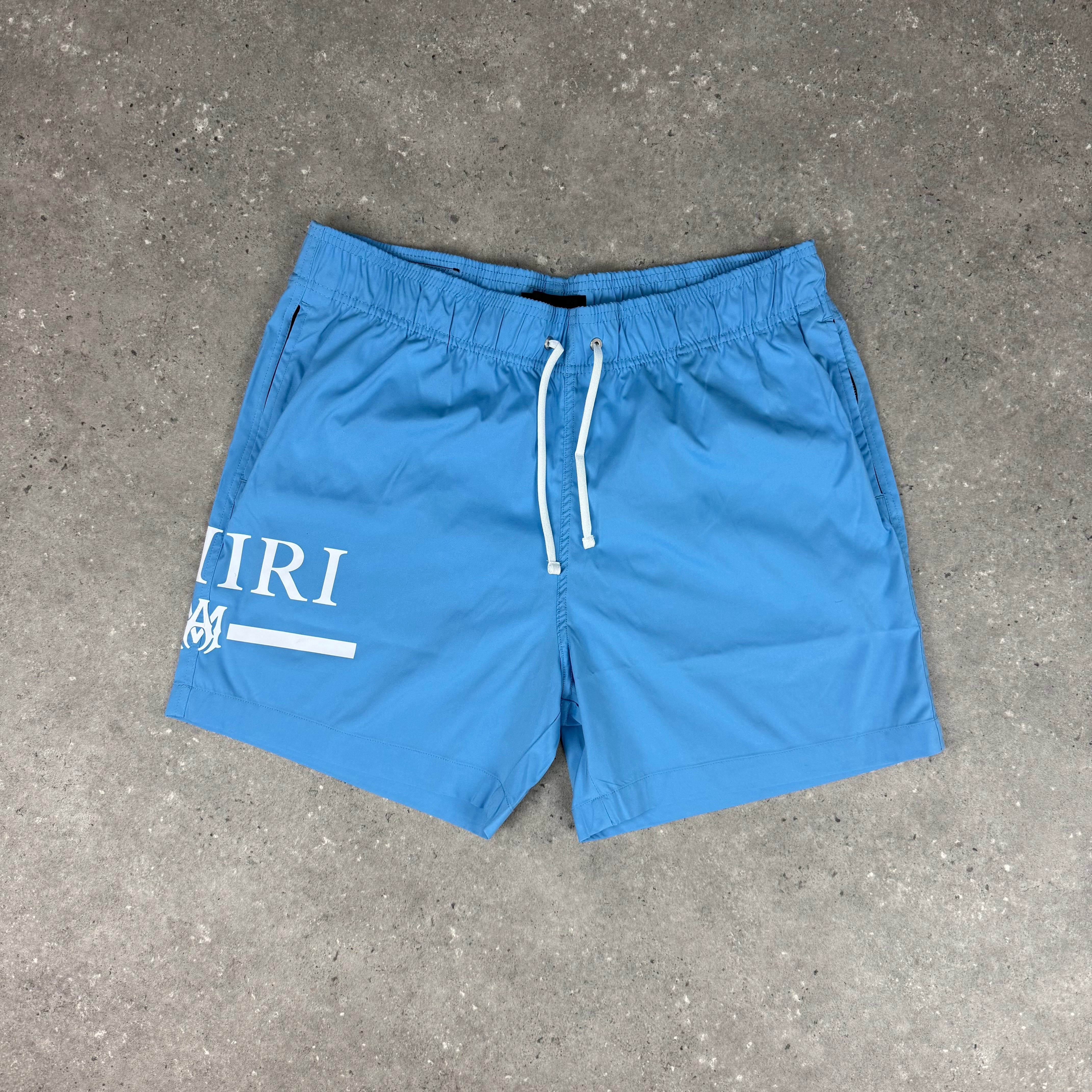AMIRI CAROLINA BLUE SWIM SHORTS - (XL)