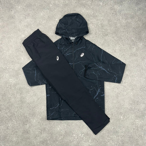 ASICS ENCHANTED WINDRUNNER JACKET & WOVEN SLIM PANT SET - BLACK