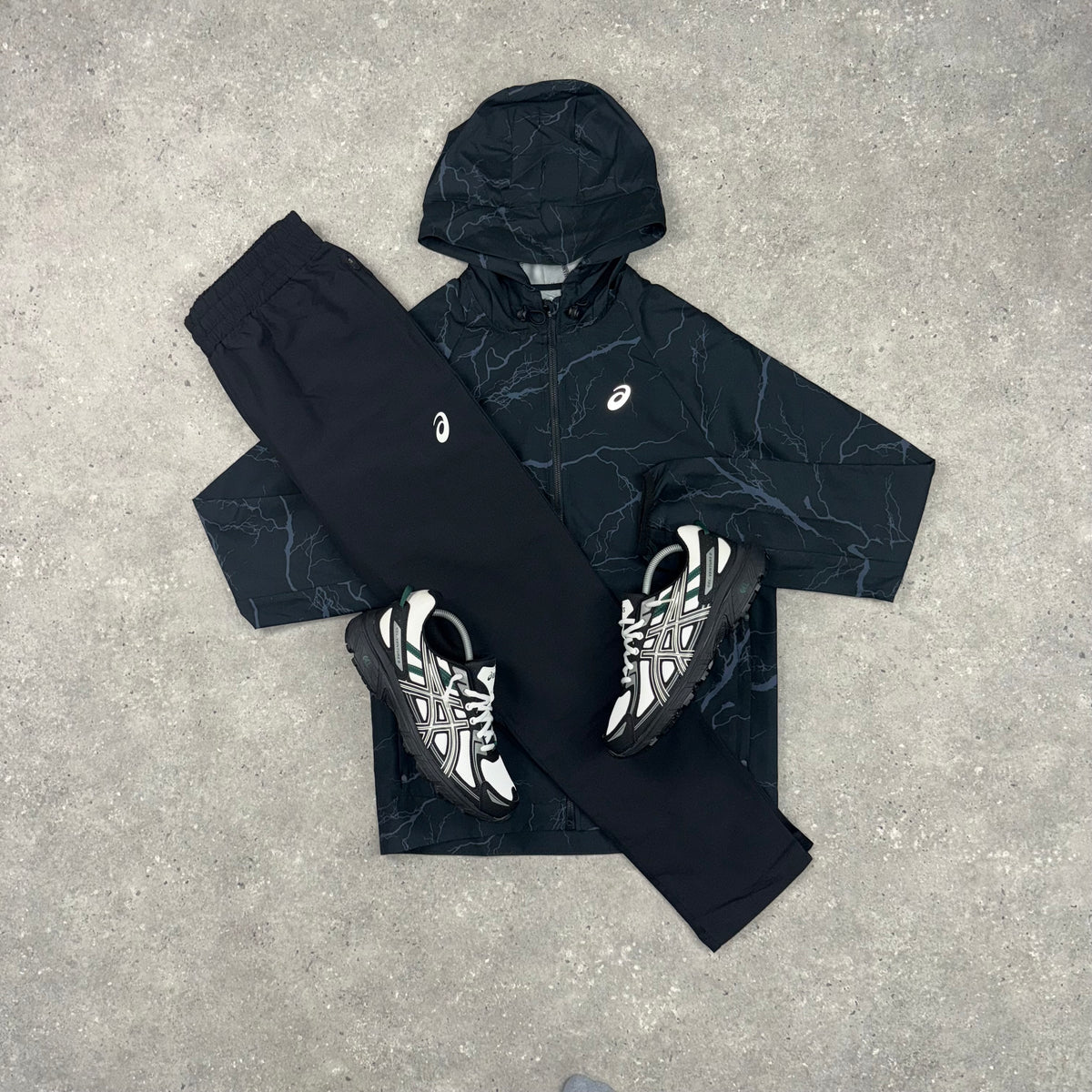 ASICS ENCHANTED WINDRUNNER JACKET & WOVEN SLIM PANT SET - BLACK